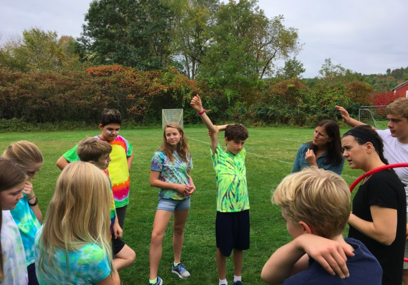 The Happy Campers connecting Lyme School Values to their group initiative